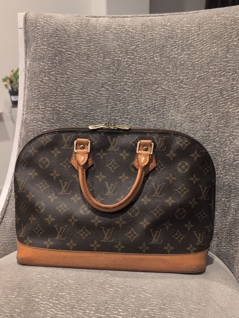 Louis Vuitton Monogram Alma Handbag in Brown